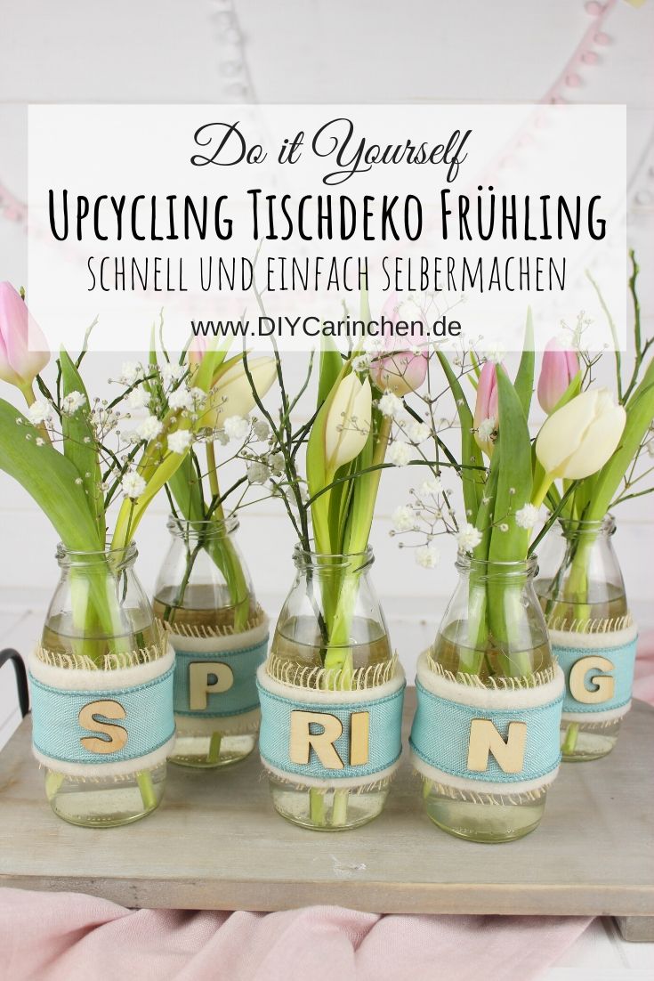 Upcycling Frühlingsdeko aus alten Flaschen mit Bändern